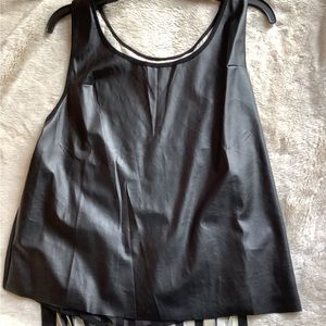 Faux leather top with a twist.